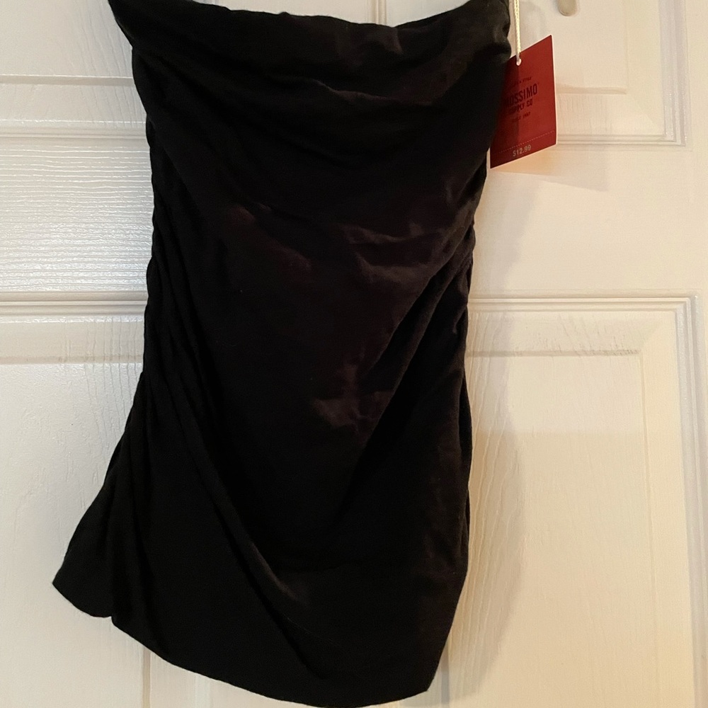 Black sleeveless top.